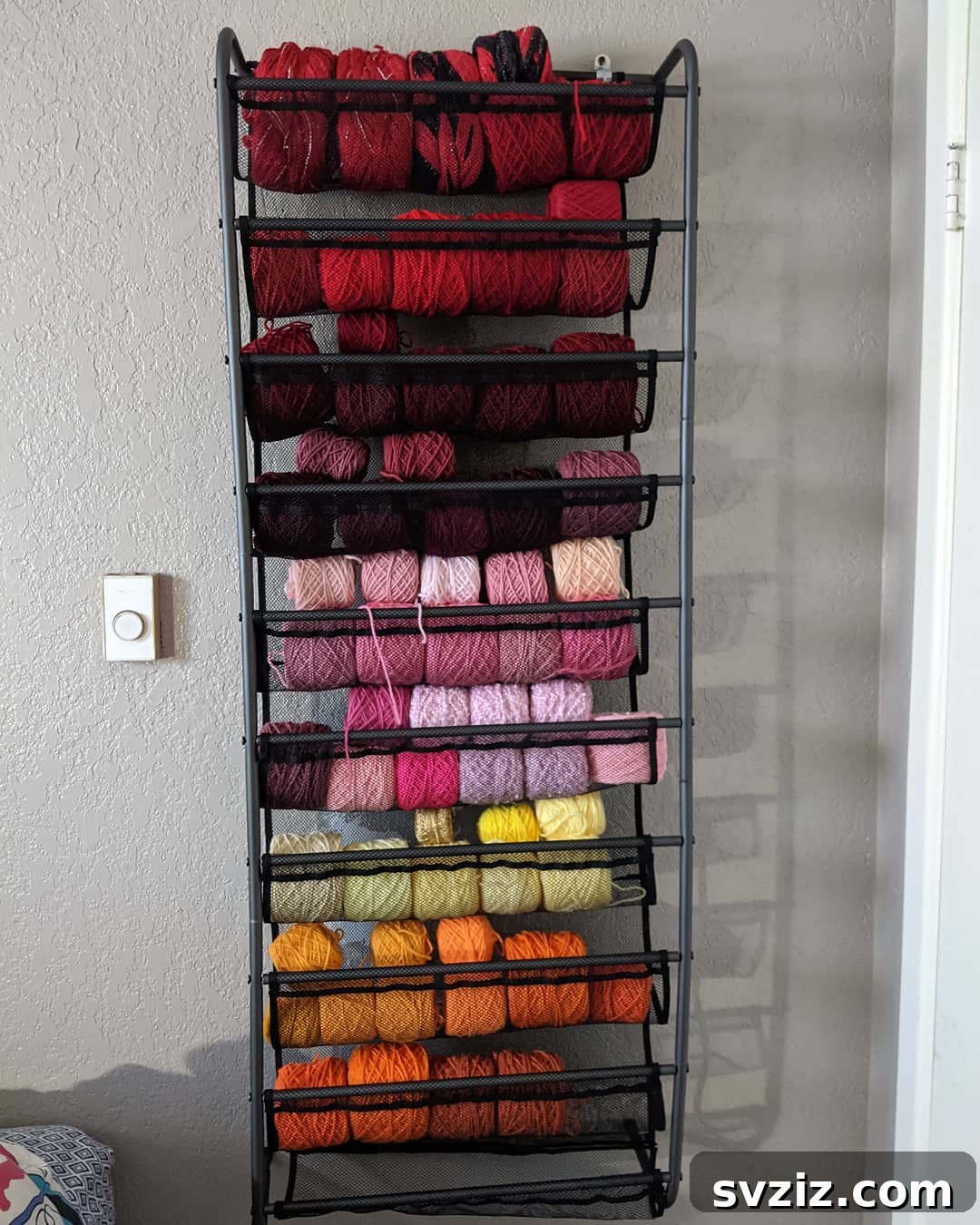 21 Ingenious Yarn Storage Solutions 18 A simple yet effective yarn rack displaying an array of colorful yarn skeins.