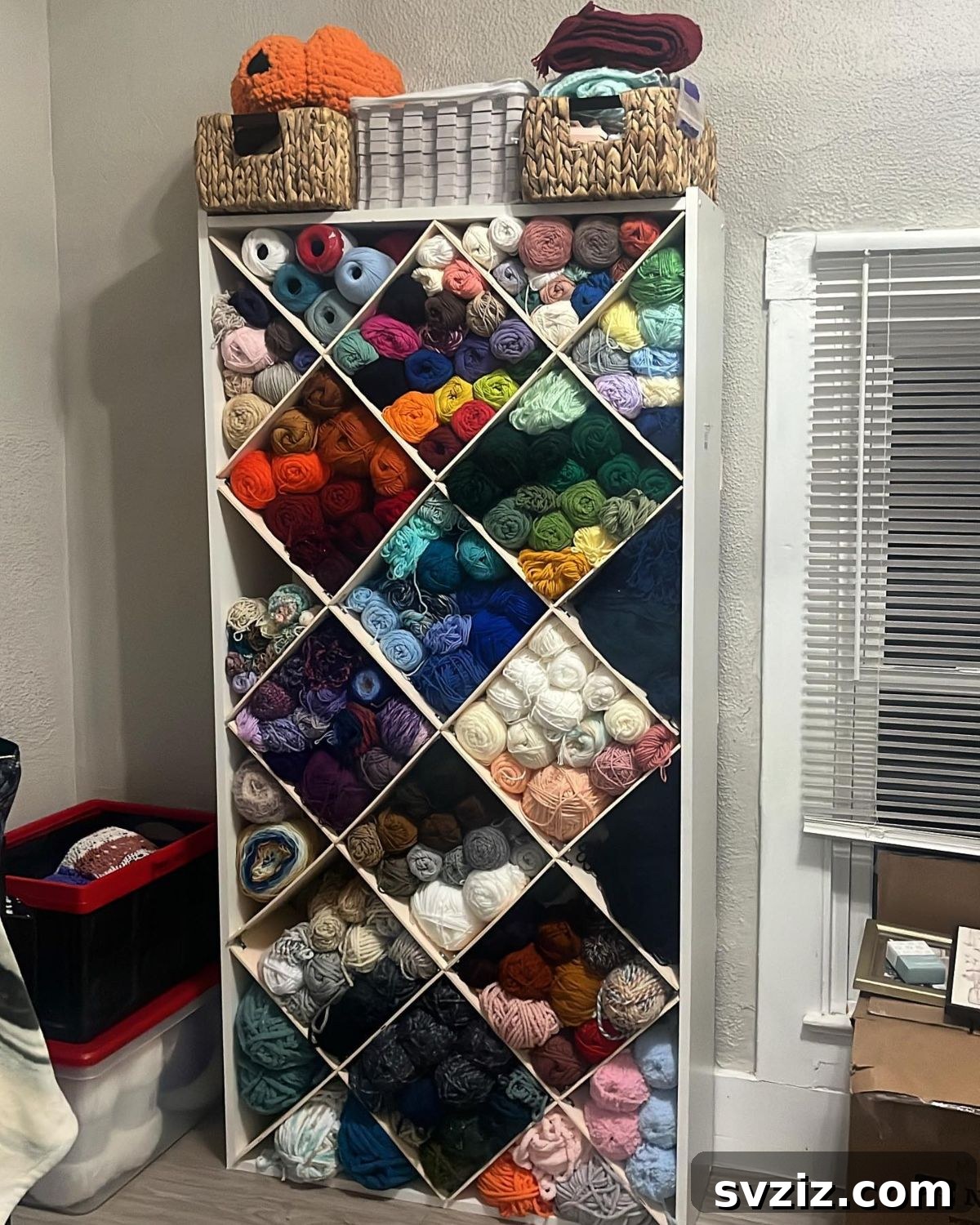 21 Ingenious Yarn Storage Solutions 4 A custom-built yarn shelf brimming with a colorful yarn collection.