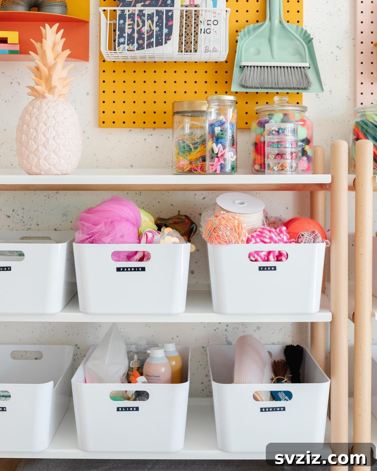 Unlock Creativity: Smart Organization for Your Art Studio 13 Clearly labeled storage bins on shelves in an art room, organizing various table supplies and craft materials. This system ensures easy identification, quick distribution, and efficient cleanup, perfect for maintaining order in a busy classroom environment.
