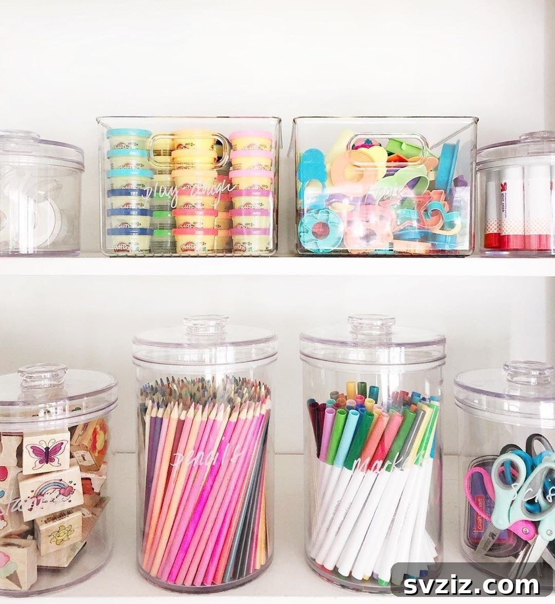 Unlock Creativity: Smart Organization for Your Art Studio 17 Clear stationery organizers filled with colorful art supplies like markers and pencils, providing visible and accessible storage for an art room. These cost-effective and reusable units are easy to clean, making them ideal for maintaining a tidy and efficient creative space.