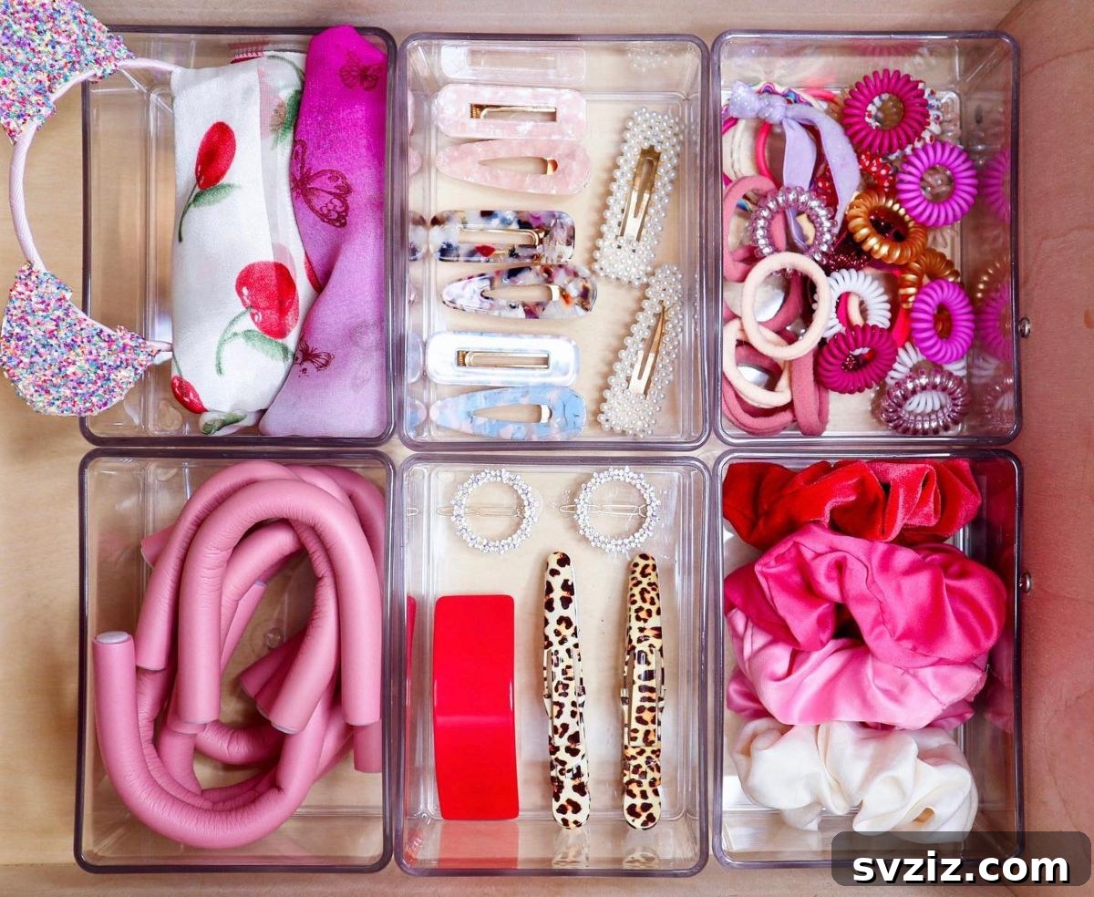 21 Ingenious Vanity Organization Hacks for a Tidy Space 12 Drawer dedicated to hair accessories, organized with clear dividers for headbands and scrunchies.