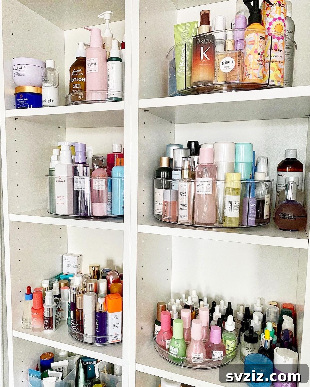 21 Ingenious Vanity Organization Hacks for a Tidy Space 18 A two-tiered Lazy Susan organizer holding a variety of skincare products on a vanity.