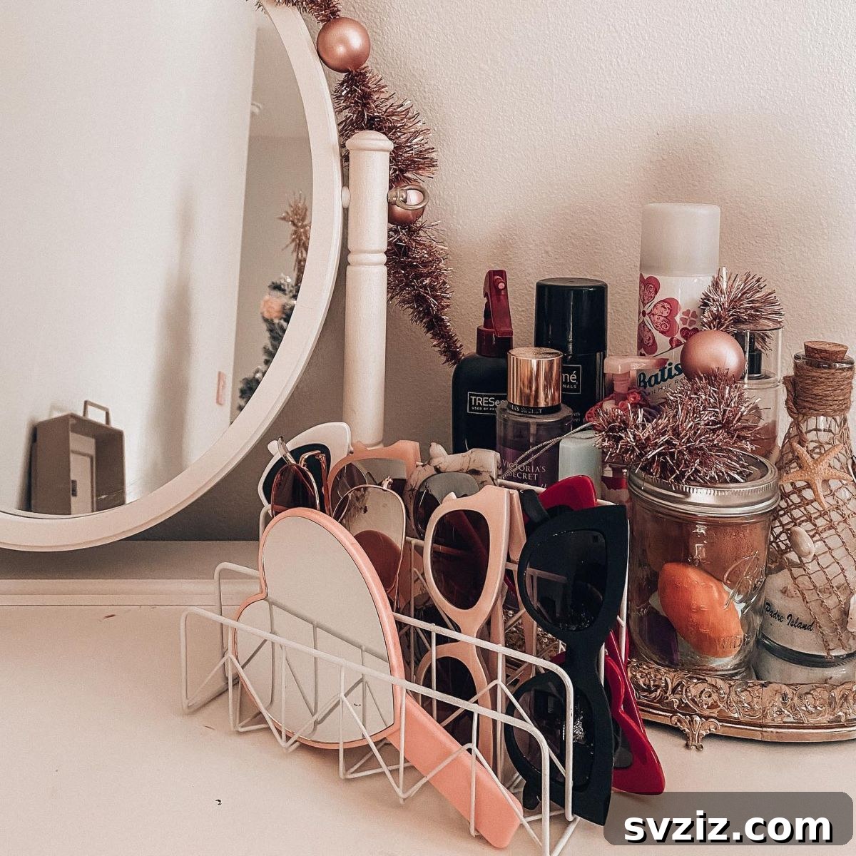 21 Ingenious Vanity Organization Hacks for a Tidy Space 19 A kitchen plate stacker repurposed as a vanity organizer, holding sunglasses and small mirrors.
