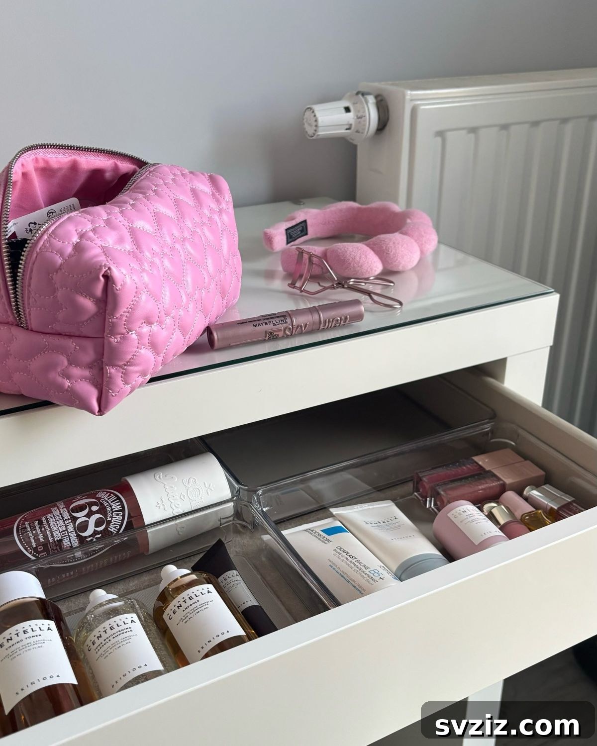 21 Ingenious Vanity Organization Hacks for a Tidy Space 4 Vanity with a sleek glass countertop, showcasing a clean and modern aesthetic.