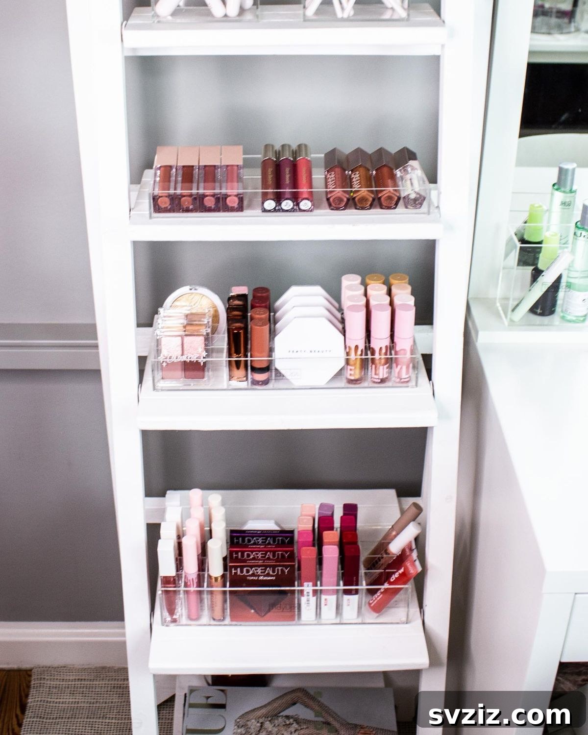 21 Ingenious Vanity Organization Hacks for a Tidy Space 7 A tall, slender shelf dedicated to makeup organization, with various products neatly displayed.