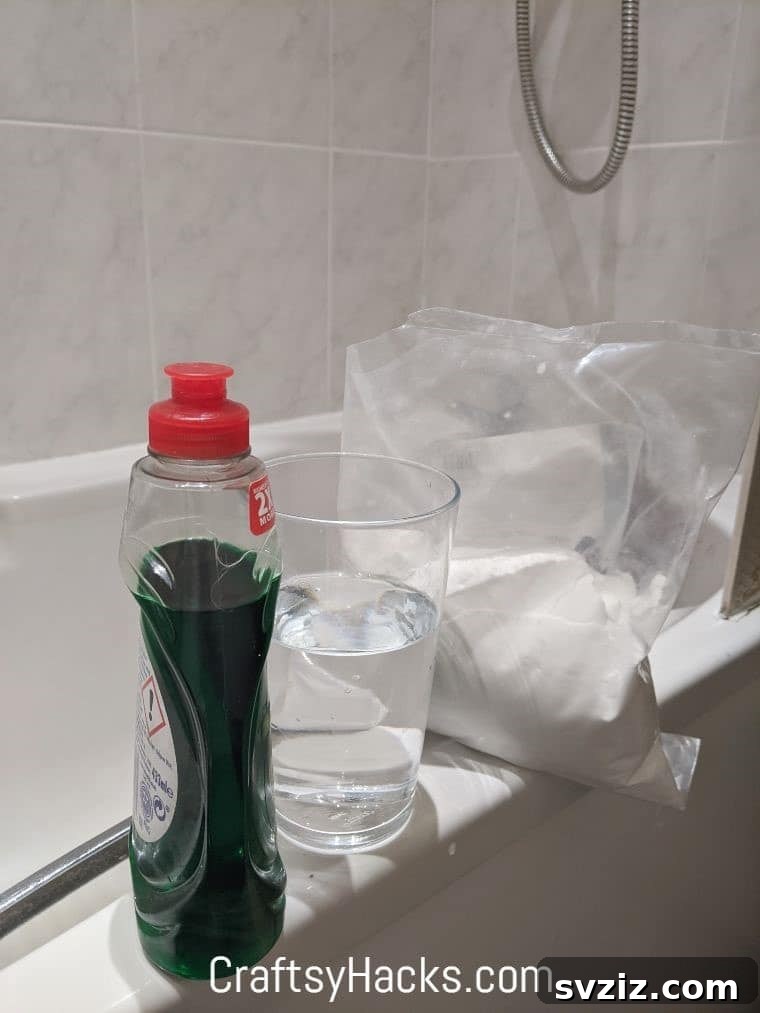 DIY bathtub cleaner with baking soda, soap, and vinegar for easy cleaning