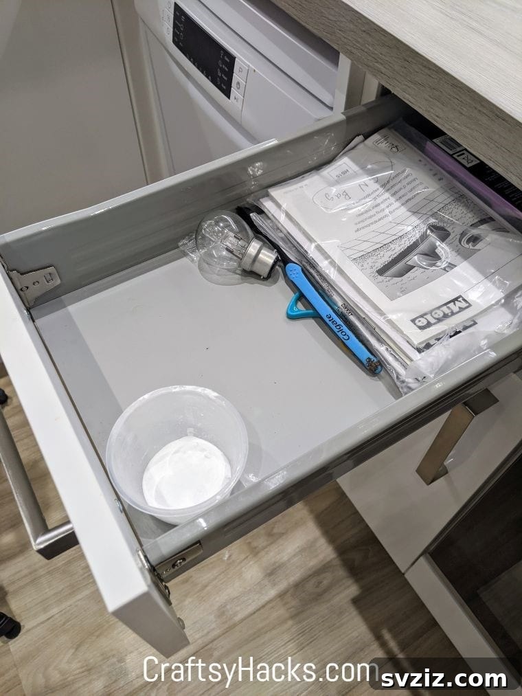 Deodorizing dresser drawers with an open box of baking soda