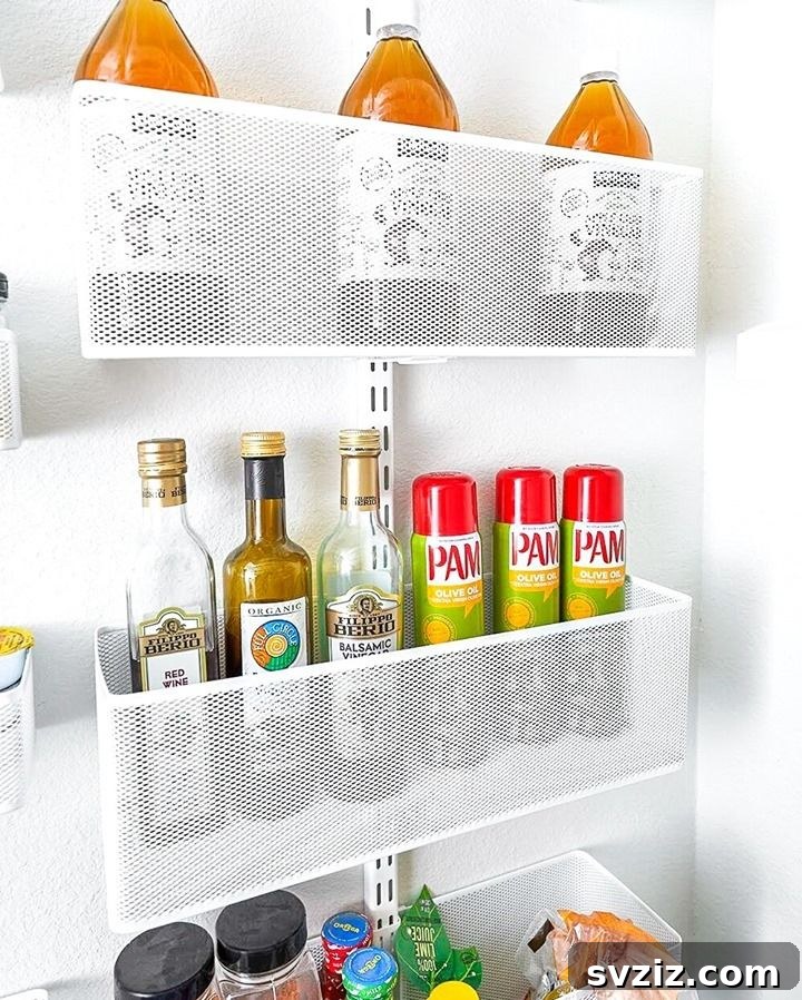 21 Genius Vertical Pantry Hacks for Ultimate Organization 17 Comprehensive strategy for expanding pantry space by utilizing every free vertical surface, including doors and walls.