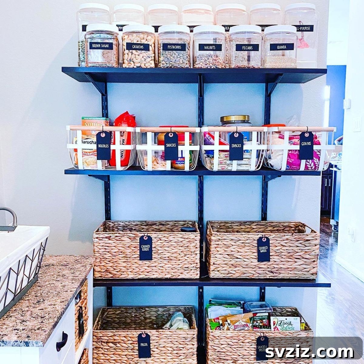 21 Genius Vertical Pantry Hacks for Ultimate Organization 8 DIY vertical pantry wall with mounted metal shelves and storage boxes, offering custom, instant storage.