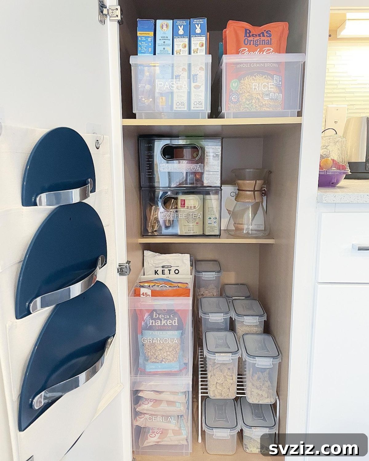 21 Genius Vertical Pantry Hacks for Ultimate Organization 9 Clever hanging lid storage solution using plastic dividers on the inside of a cabinet door, organizing awkward pot lids.