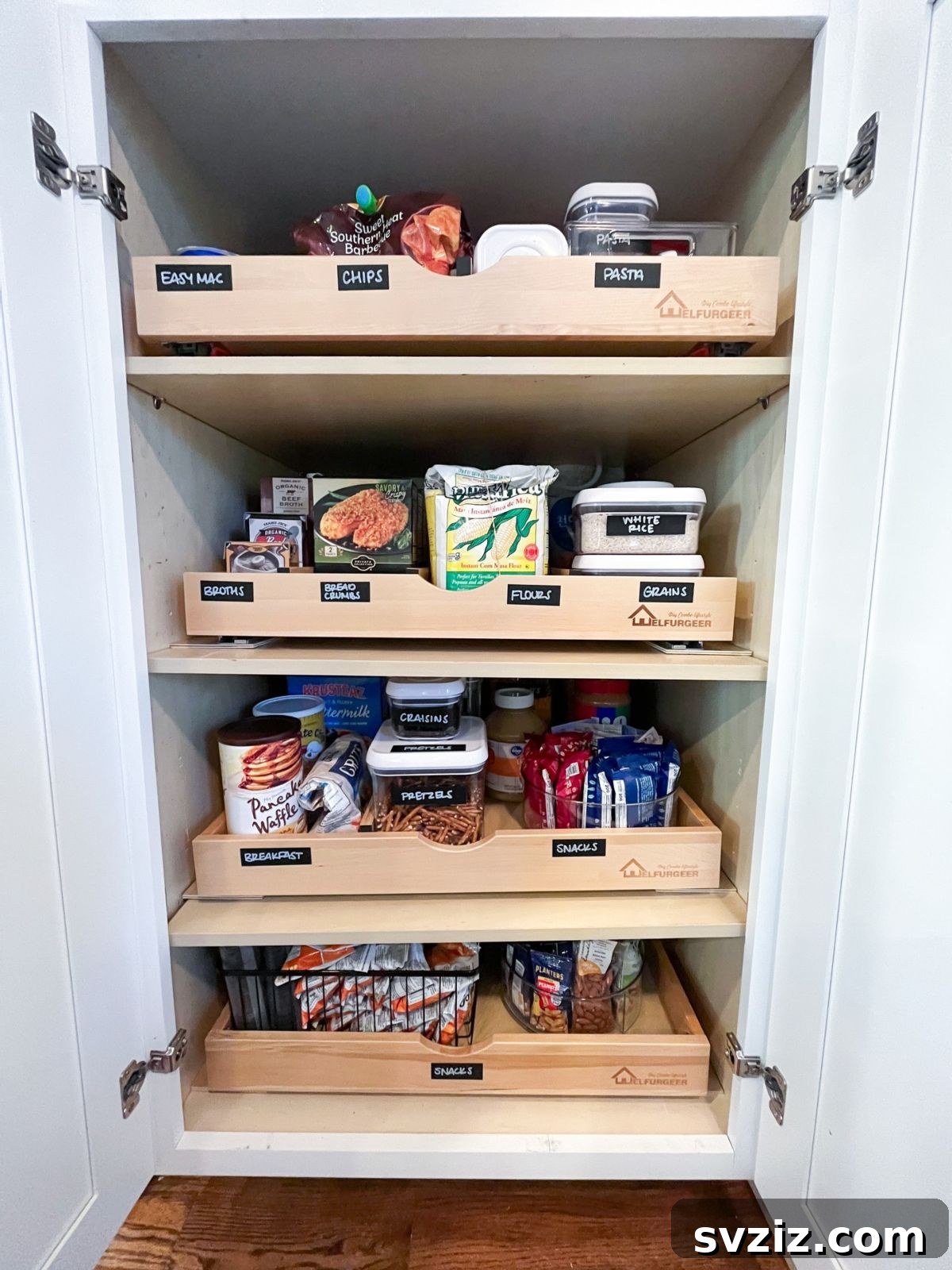 Organized kitchen pantry with pullout wooden bins