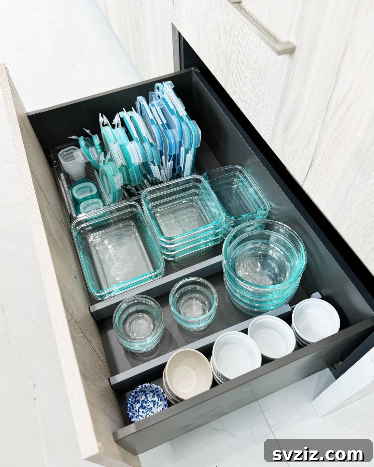 Organized Tupperware pullout drawer with compartments