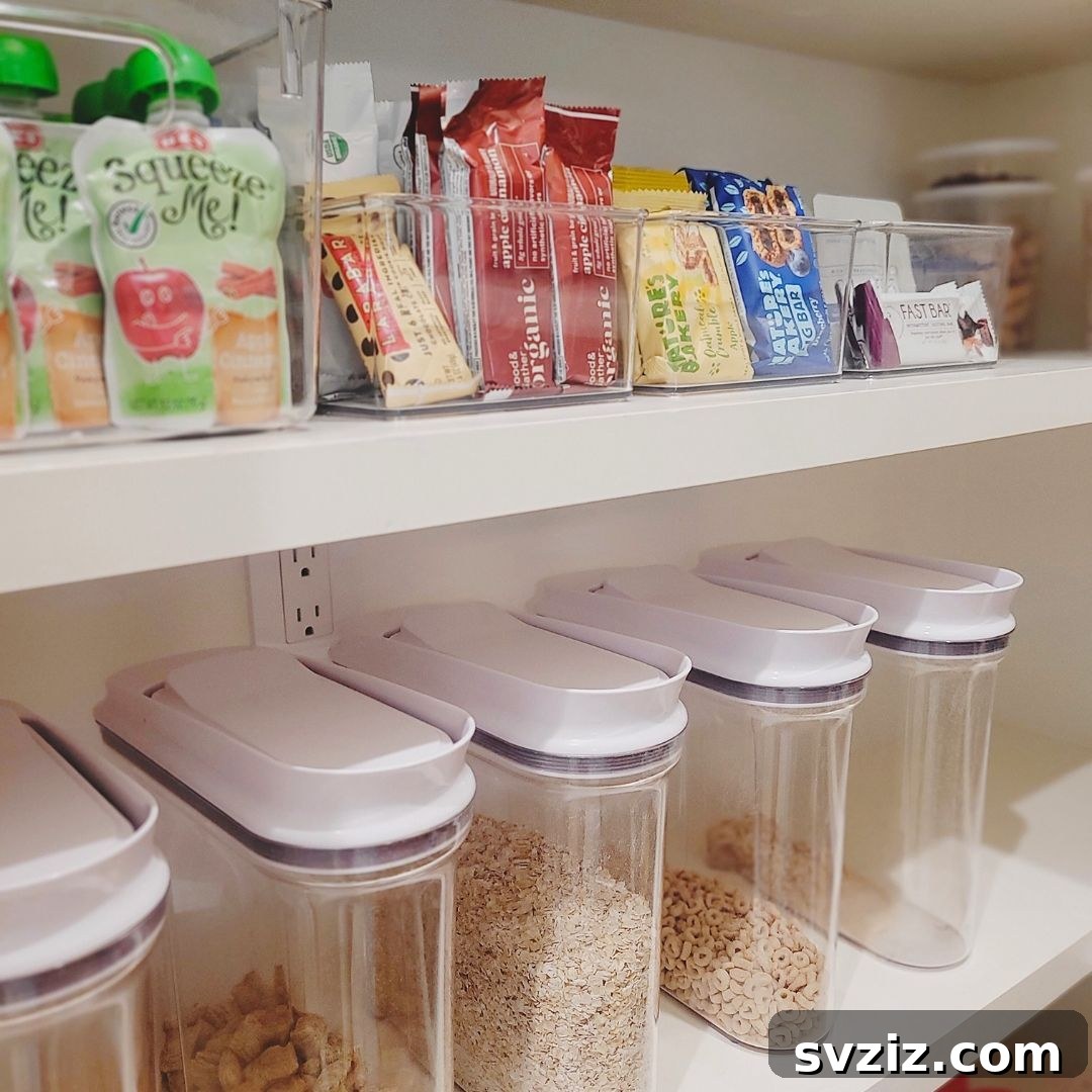 Pullout pantry with organized dry goods in clear canisters