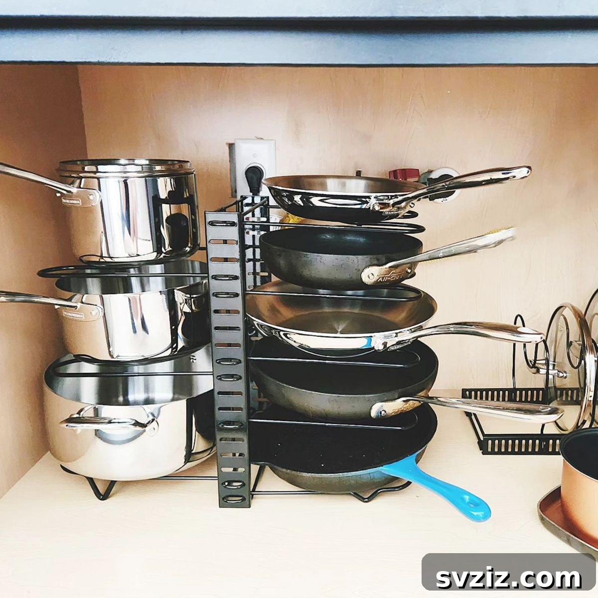 21 Genius Vertical Kitchen Hacks to Maximize Your Space 4 Pot & Pan Organizer