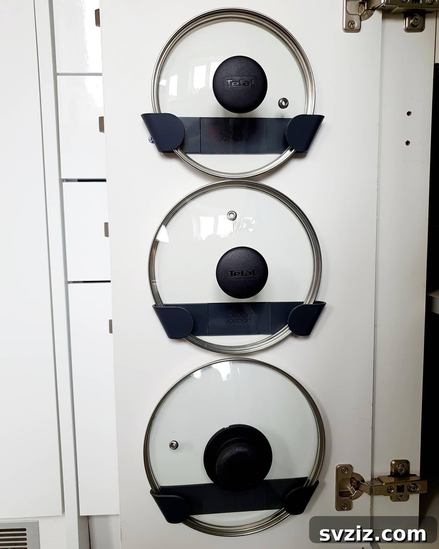 21 Genius Vertical Kitchen Hacks to Maximize Your Space 9 pan lid holders