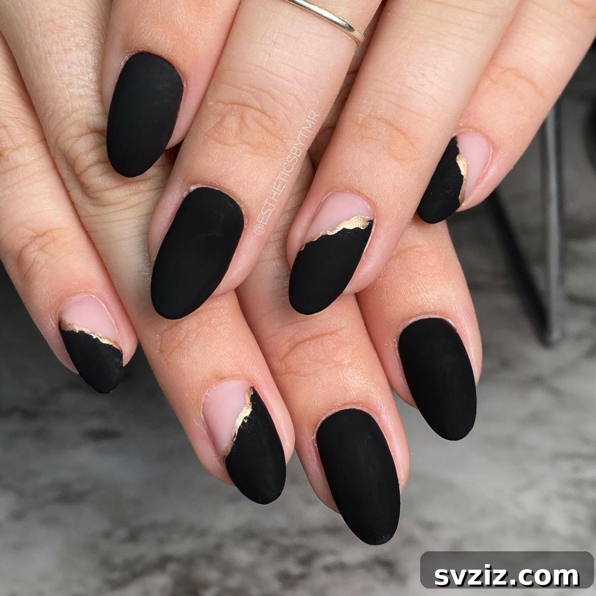 31 Chic Short Matte Nail Designs to Try Now 20 Elegant short matte black and gold manicure with subtle gold pops on accent nails.
