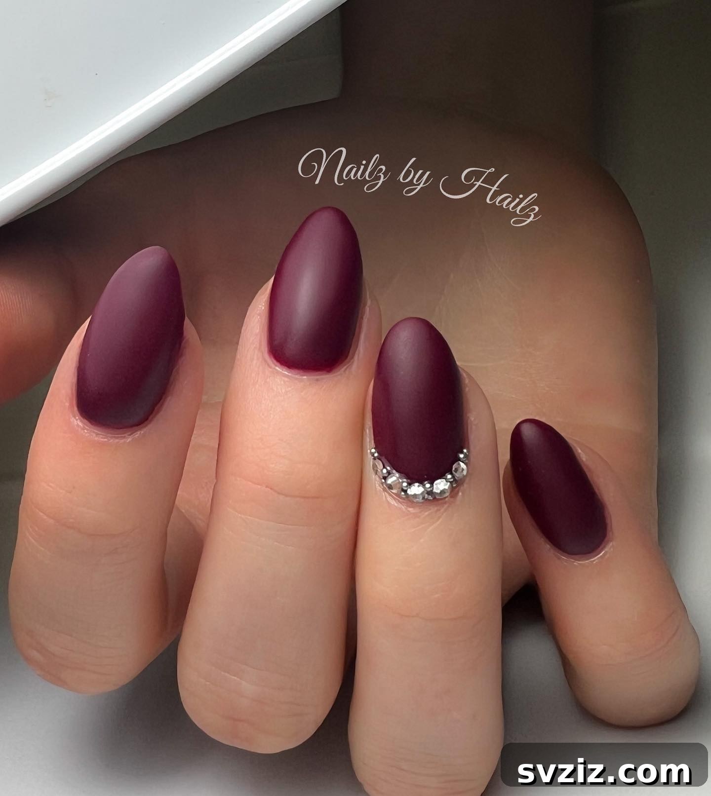 31 Chic Short Matte Nail Designs to Try Now 27 Short matte burgundy nails enhanced with elegant rhinestone embellishments, perfect for fall or winter weddings.