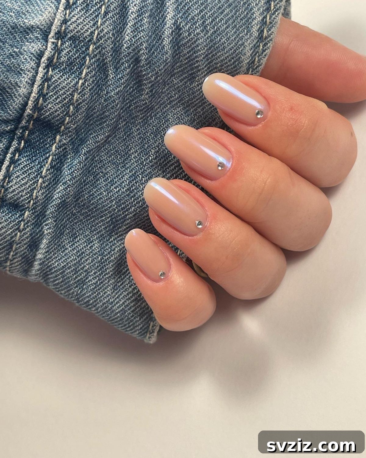 Glamorous Minimalist Nails with Subtle Rhinestone Accents