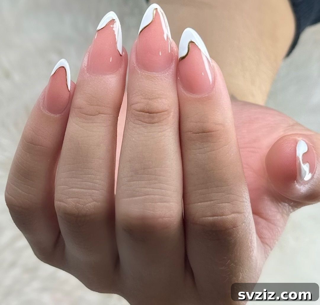 Elegant French Tips with Dainty Gold Accents