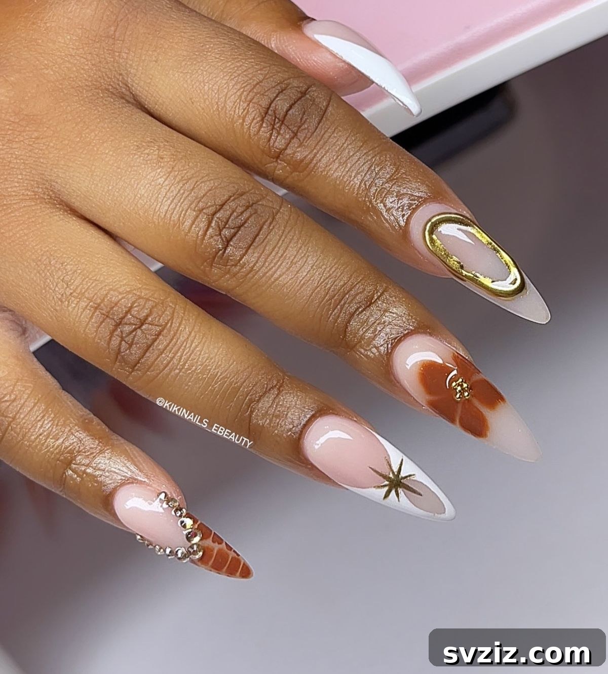 41 Chic and Elegant Nail Design Ideas 21 19. Chrome Gel with Stunning Florals