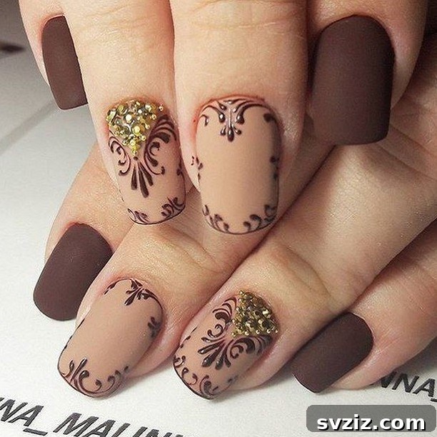 41 Chic and Elegant Nail Design Ideas 37 35. Intricate Brown Nail Designs