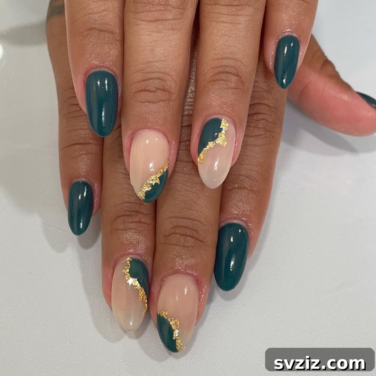 41 Chic and Elegant Nail Design Ideas 43 41. Classy Black, Nude, and Gold Manicure