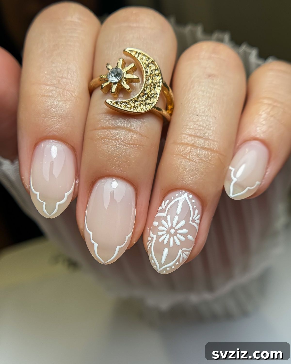 41 Effortless Nude Nail Ideas for Everyone 4 Cute and natural nude nails with delicate, intricate designs for a charming, understated look.