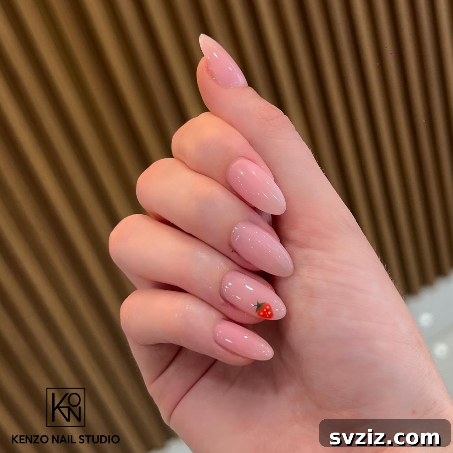 41 Effortless Nude Nail Ideas for Everyone 39 Playful strawberry accent nails on a nude base, perfect for adding a fun, unexpected touch of cuteness.