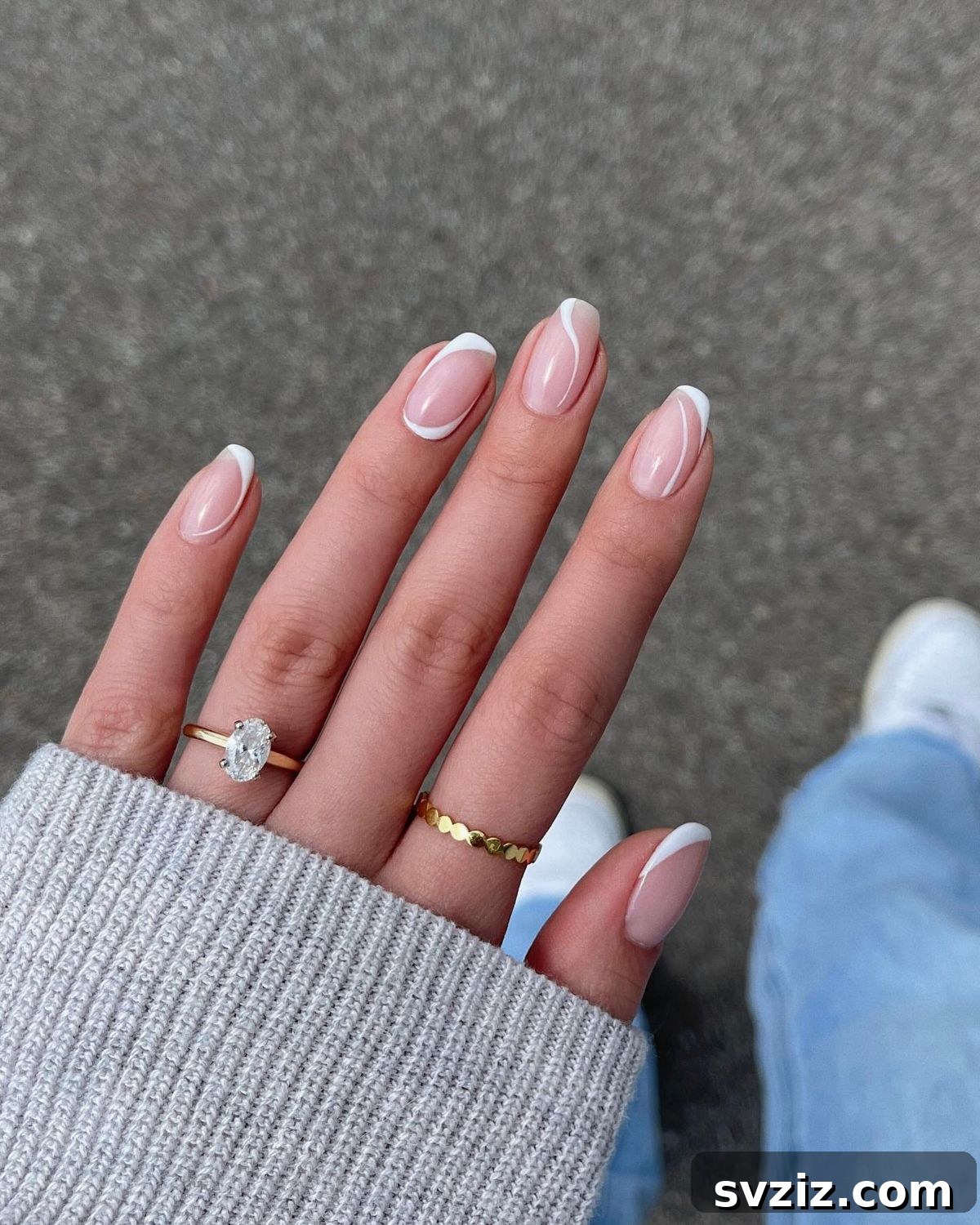 41 Effortless Nude Nail Ideas for Everyone 5 Classic squoval nude nails, combining rounded and square shapes for a universally flattering manicure.