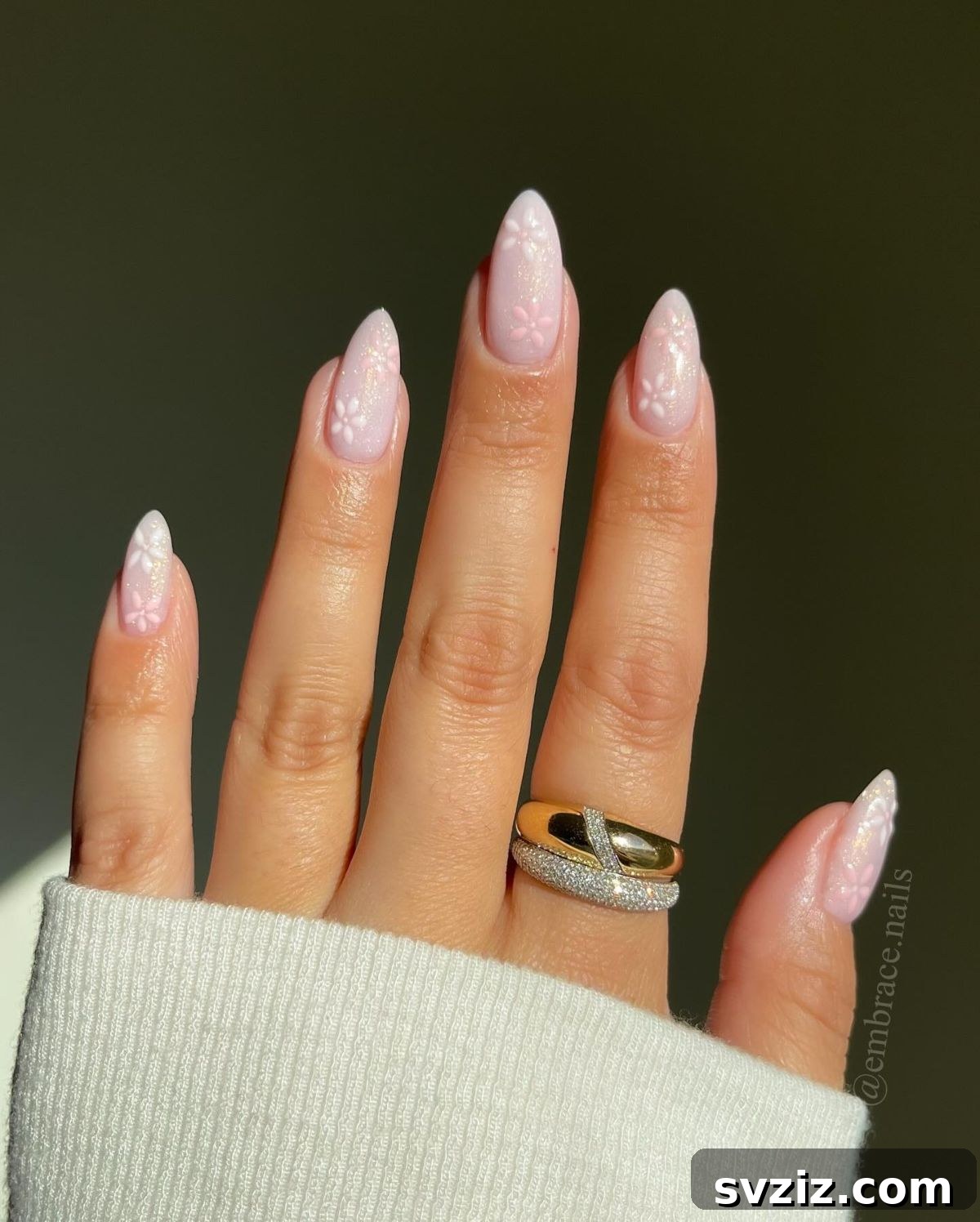 41 Effortless Nude Nail Ideas for Everyone 7 Delicate floral designs on a nude nail base, enhancing length and adding a touch of sweet elegance.