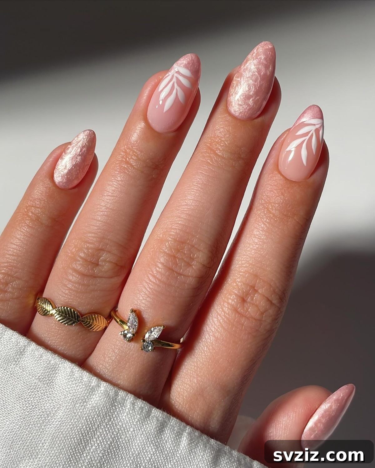 41 Effortless Nude Nail Ideas for Everyone 10 Stunning pink nude manicure with romantic designs, perfect for weddings or elegant occasions.