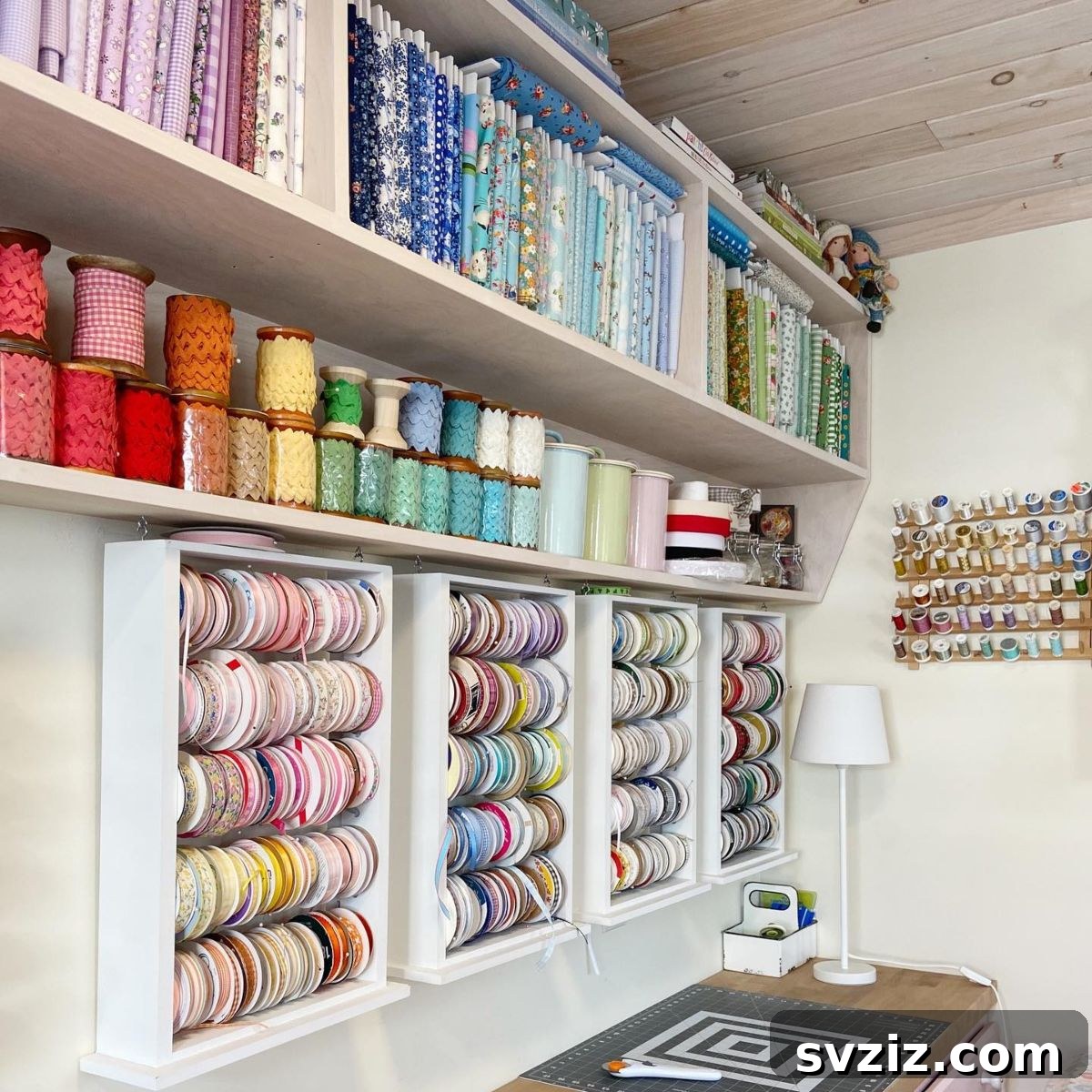 Wall-mounted ribbon racks displaying various spools of ribbon, organized by color and type.