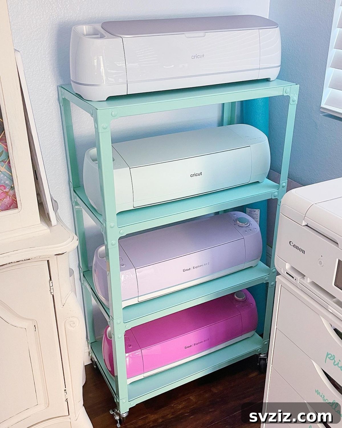 Multi-level storage tower used to organize bulky craft room machines and supplies.