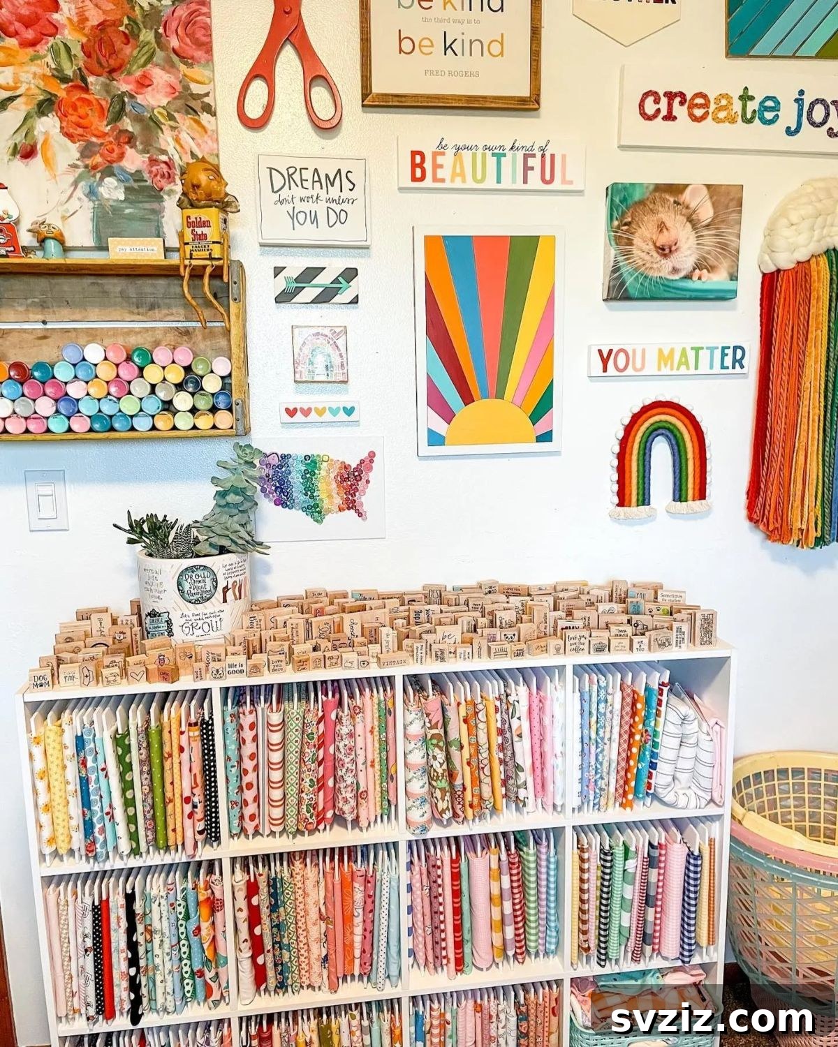 Fabric shelf with neatly folded fabrics, organized like books for easy access and visibility.