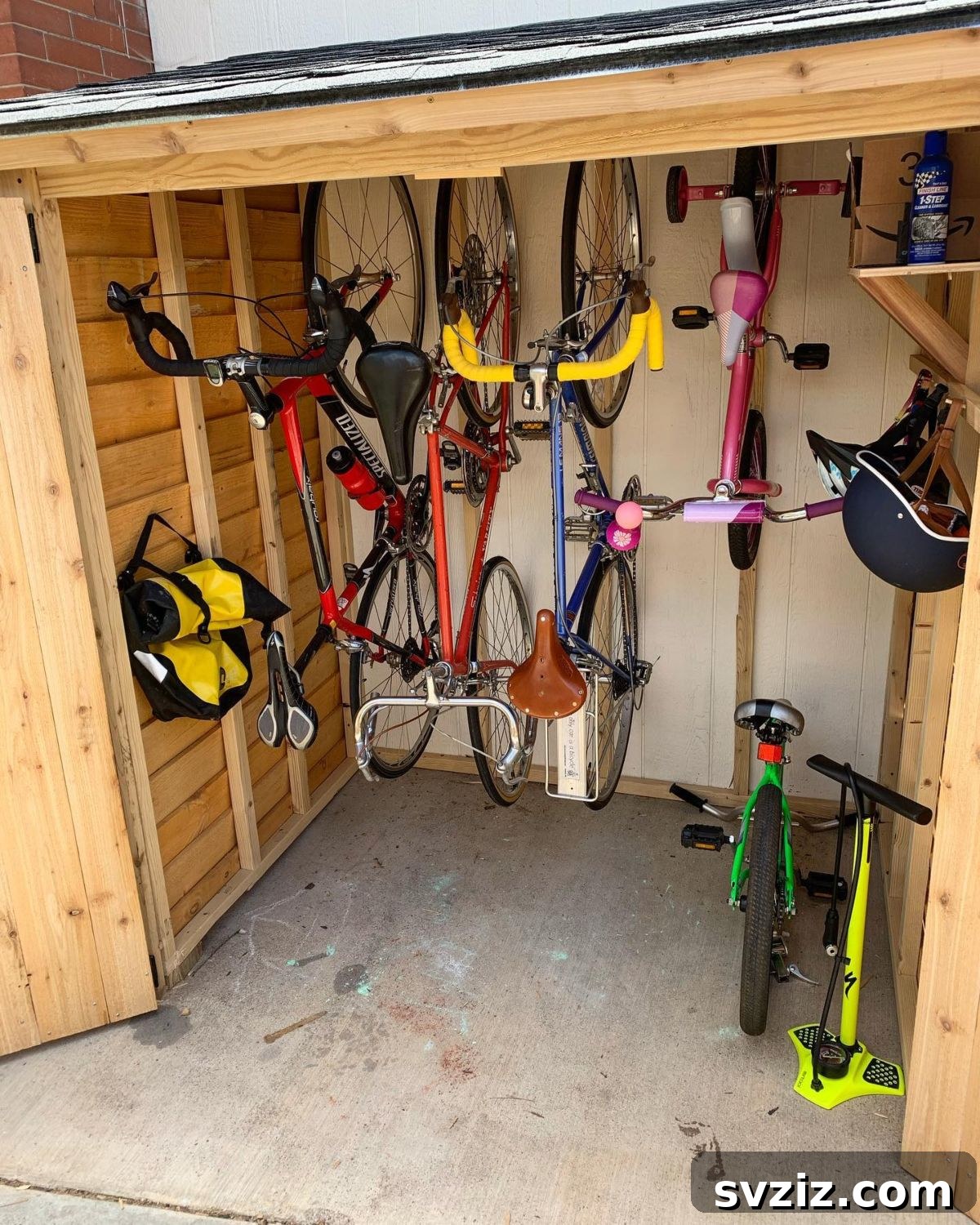 21 Genius Shed Organization Ideas for a Clutter-Free Outdoor Oasis 5 3. Hanging Bikes