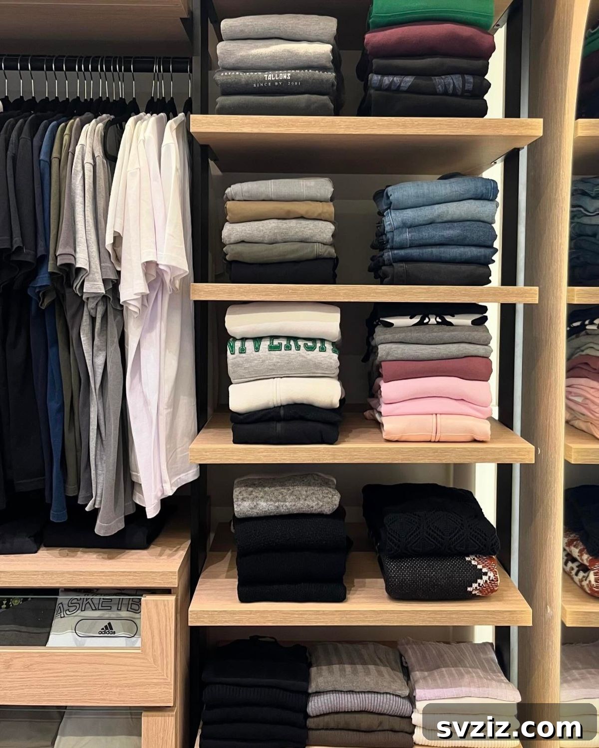 Floor-to-ceiling wooden shelves for folded clothes and storage