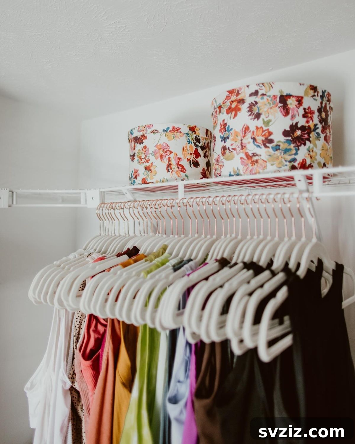 Under-shelf clothing rail for hanging tops and shirts