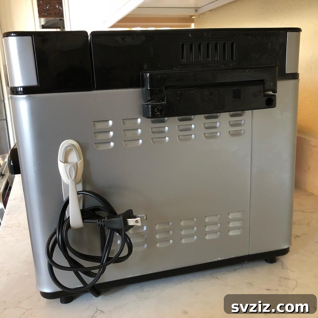 27 Genius Command Hook Hacks for an Organized Home 17 Organize Appliance Cords with Command Hooks