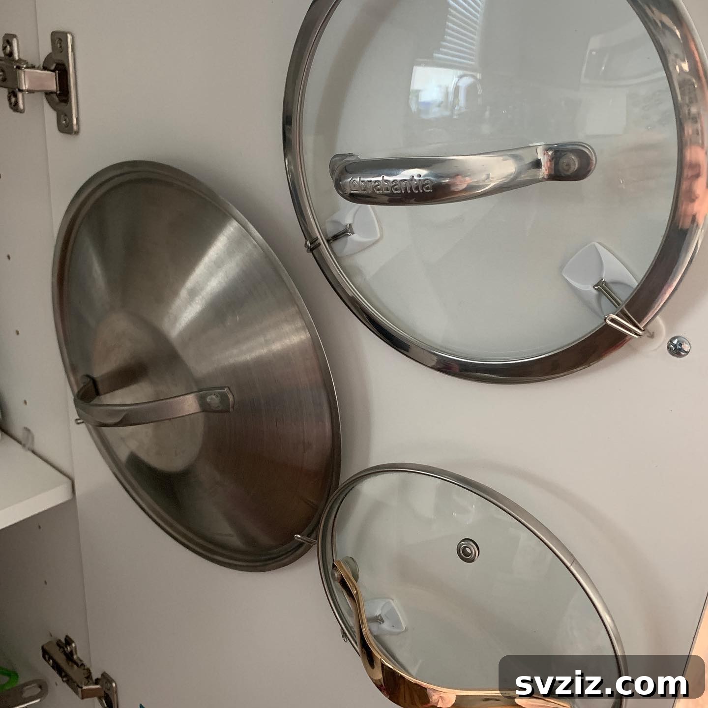 27 Genius Command Hook Hacks for an Organized Home 28 Command Hook Hacks for Pot Lid Holders