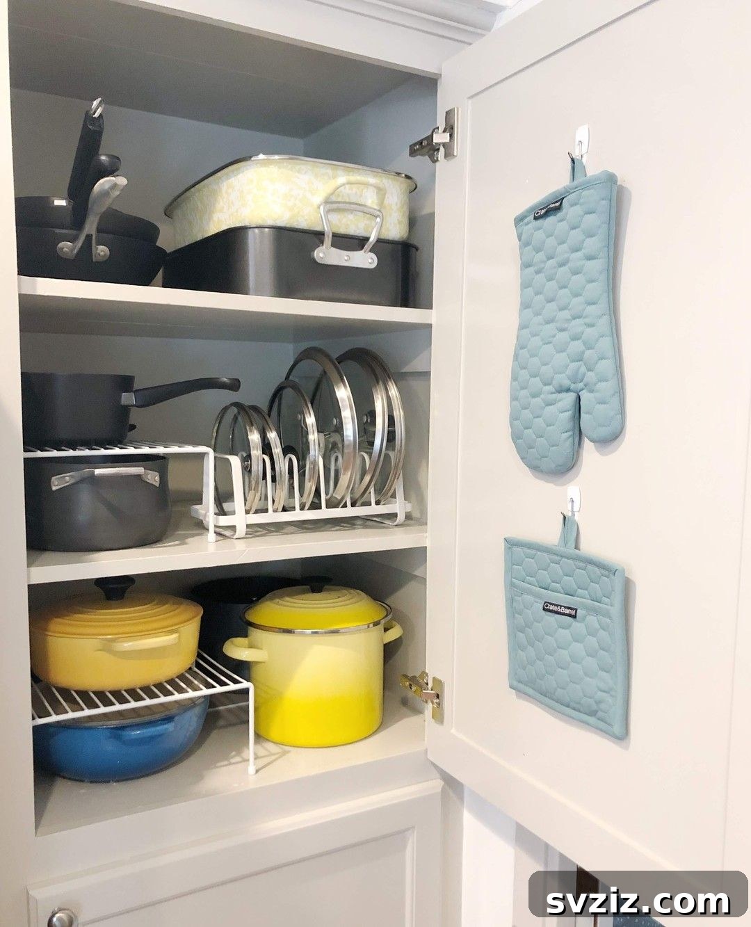 27 Genius Command Hook Hacks for an Organized Home 4 Command Hook Ideas for Pot Holders