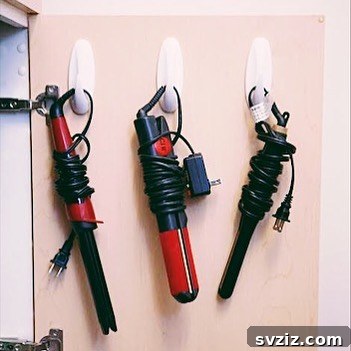 27 Genius Command Hook Hacks for an Organized Home 8 Command Hooks for Hair Styling Tools