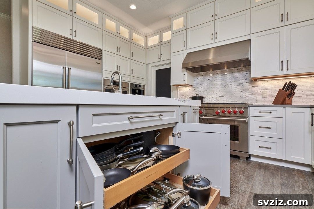 Kitchen island featuring high-end rollout storage for bulky pots and pans