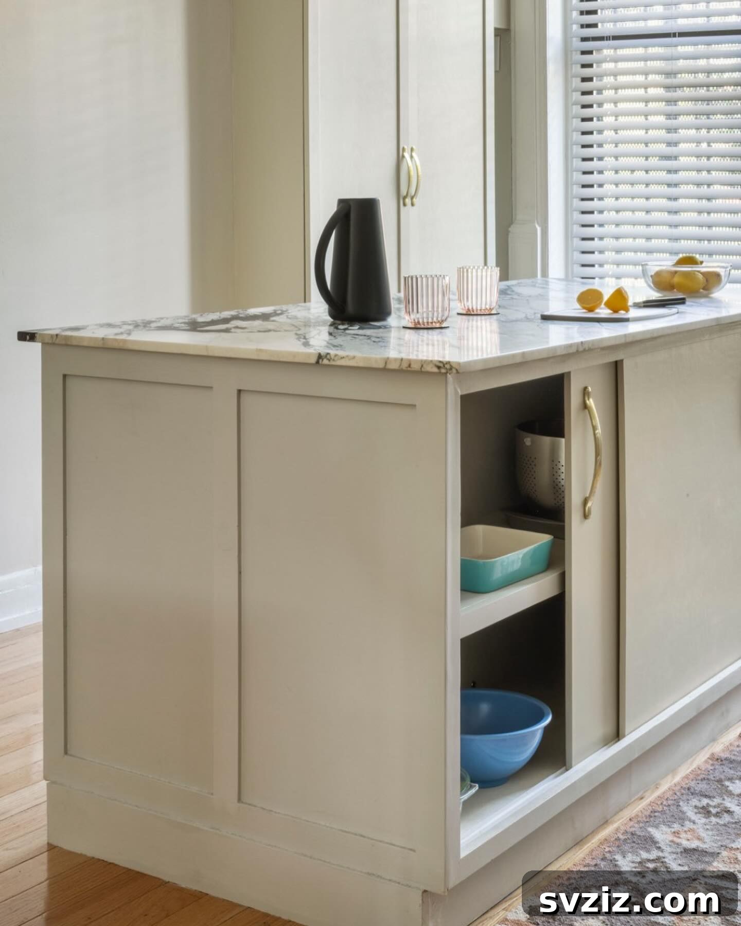 Kitchen island with cabinets and shelving on both sides for maximum storage