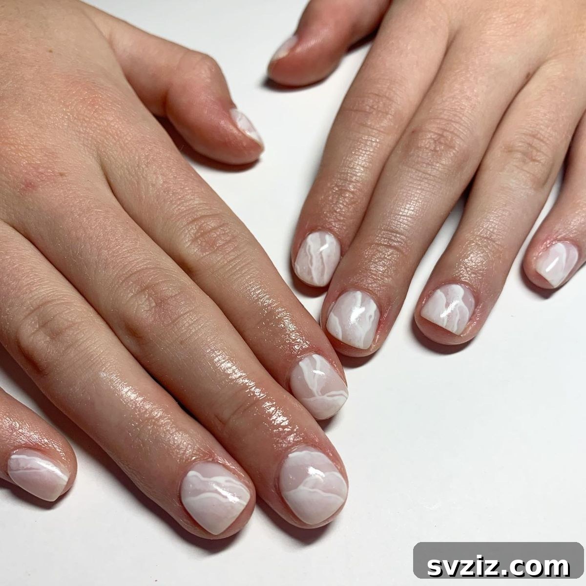 8. Snowy White Designs