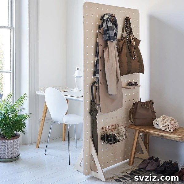 Unlock Every Inch: 21 Vertical Bedroom Organization Secrets 10 8. Pegboard Room Divider