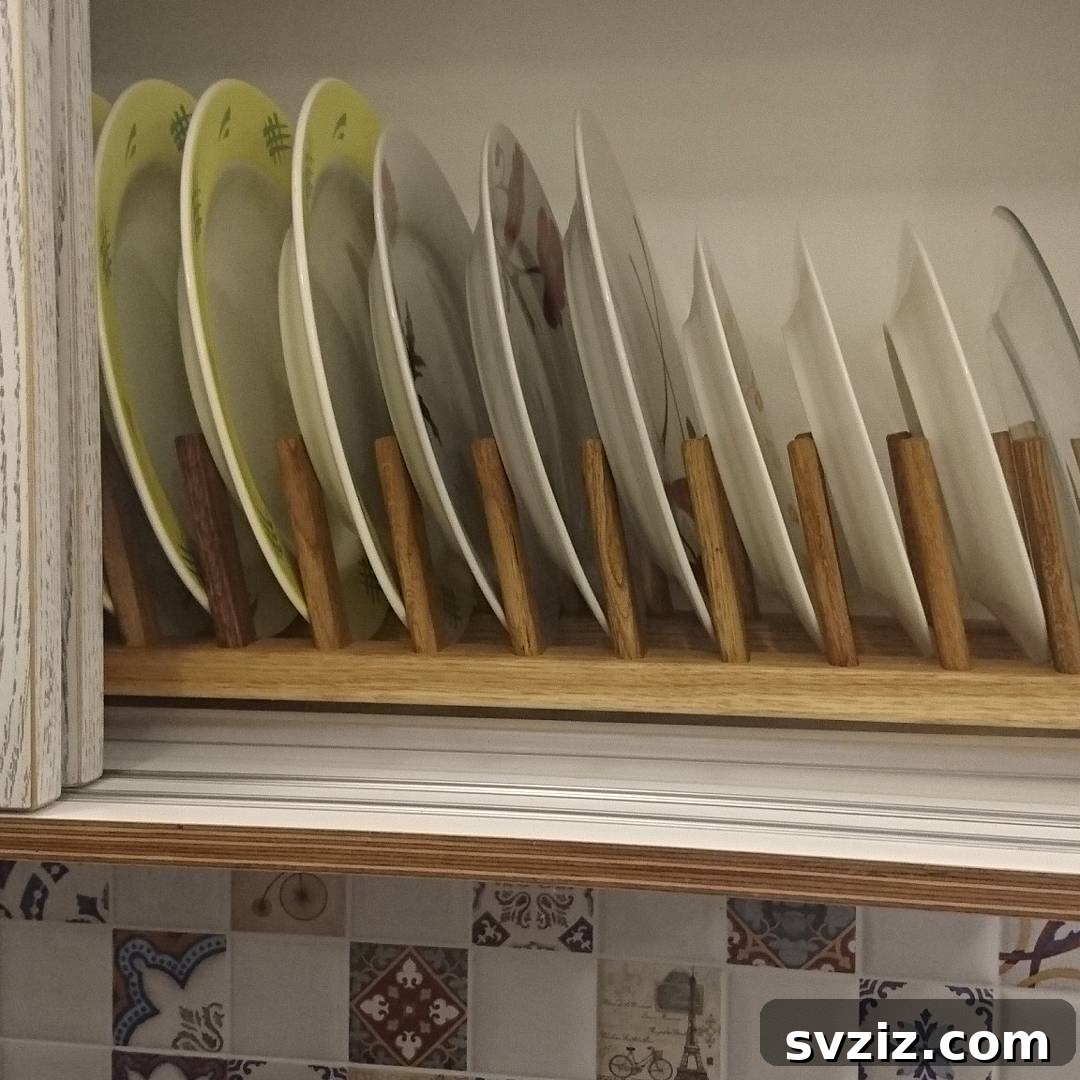 Smart Plate Organization Ideas for a Perfectly Tidy Kitchen 11 Countertop with a simple wooden plate rack holding plates and bowls upright, also serving as a drying rack.