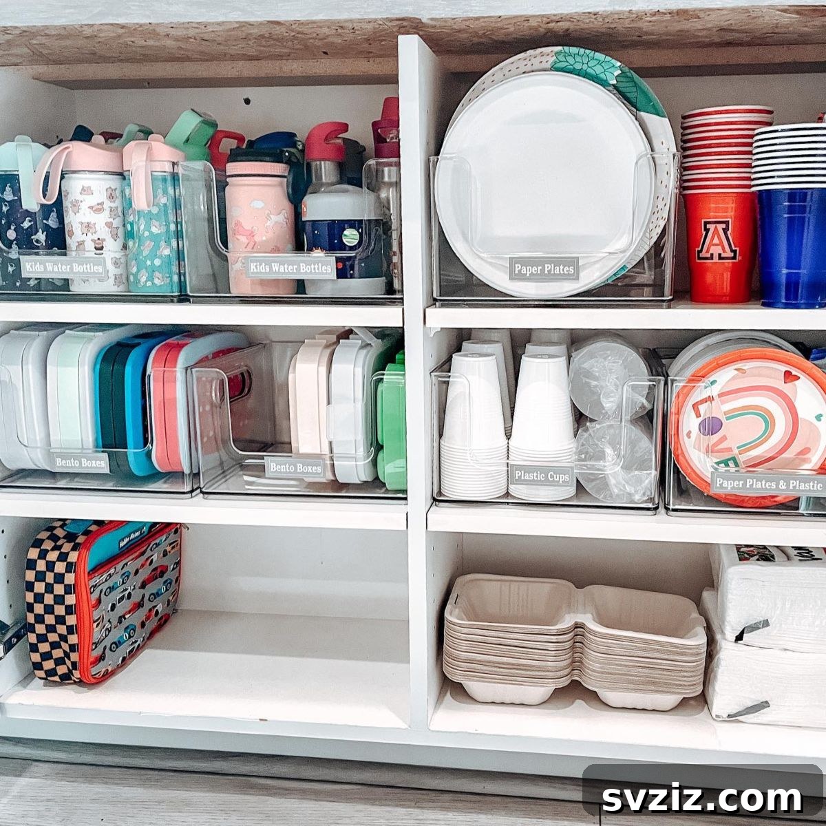 Smart Plate Organization Ideas for a Perfectly Tidy Kitchen 13 Kid-friendly kitchen cupboard organized with easily accessible plates and bowls on lower shelves for children.