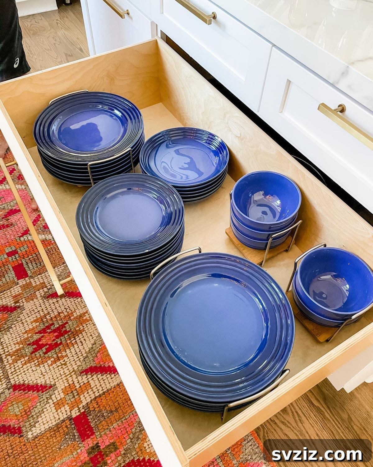 Smart Plate Organization Ideas for a Perfectly Tidy Kitchen 14 Drawer with simple plate caddies securely holding stacks of plates, preventing movement and damage.