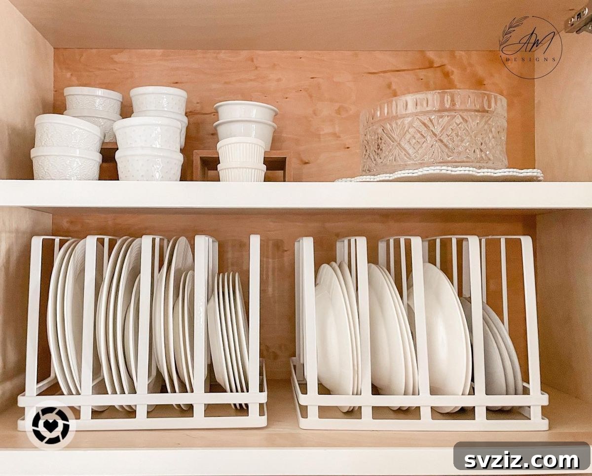 Smart Plate Organization Ideas for a Perfectly Tidy Kitchen 16 Deep kitchen cabinet using pan organizers to store large plates vertically, preventing shifting and maximizing space.