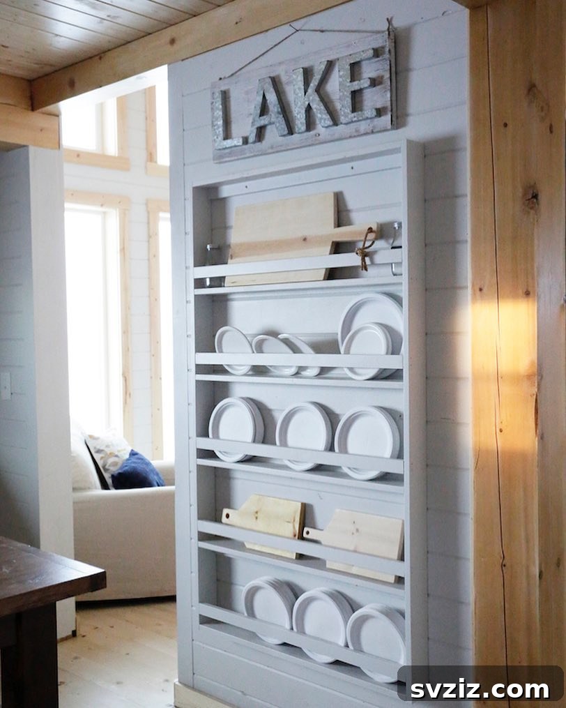 Smart Plate Organization Ideas for a Perfectly Tidy Kitchen 9 Rustic kitchen with a flush-mounted wooden plate rack, displaying plates vertically and saving space.